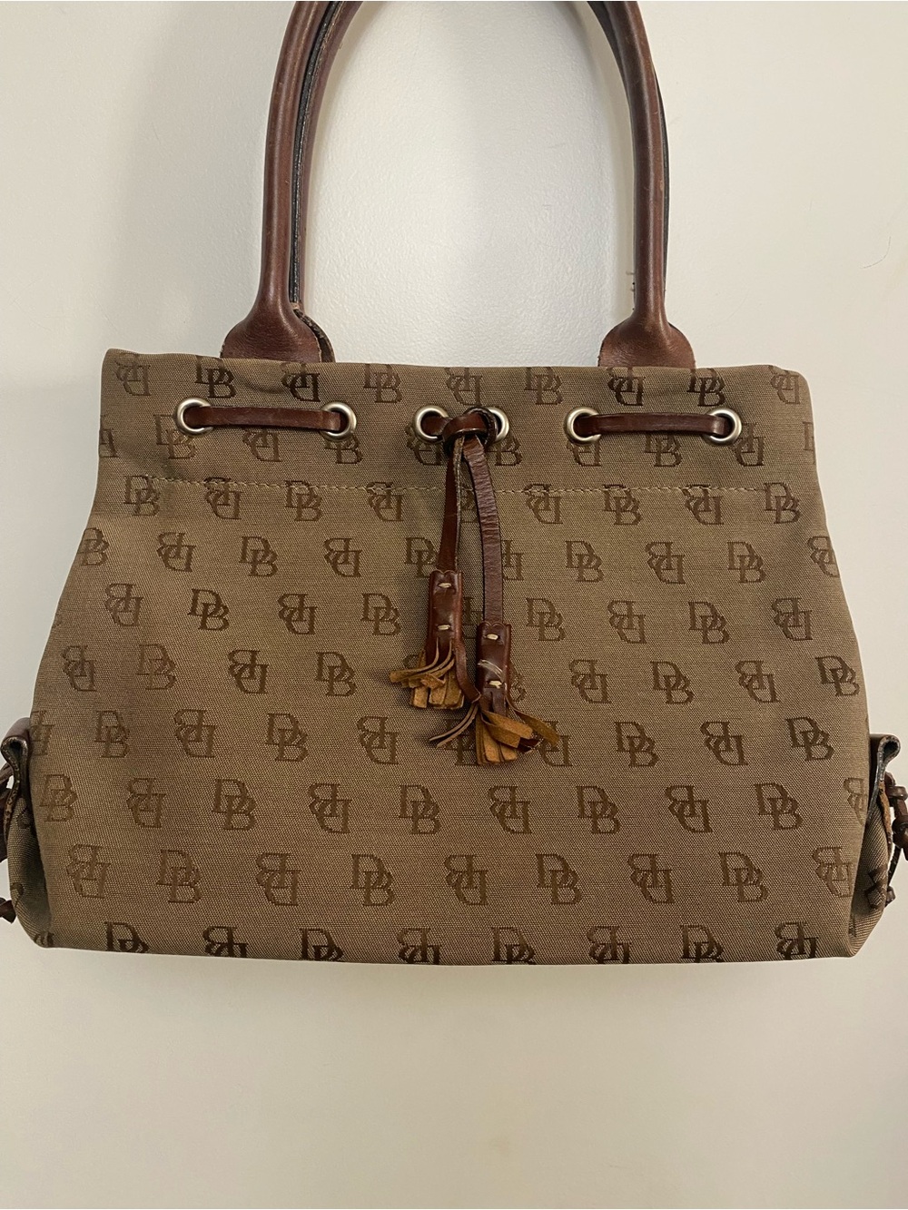 Vintage Dooney & Bourke Brown Signature Logo Canvas Tassel Bucket Bag
